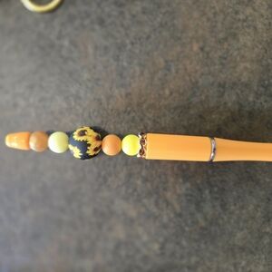 Orange Beaded Pen with Sunflower Design